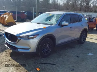 2020 Mazda CX-5 Touring with VIN JM3KFACM8L0727393, listed as a IAAI auction lot 41492627 with 91,521 mi miles. Bid and sale history available at carsss.com. Image 2.