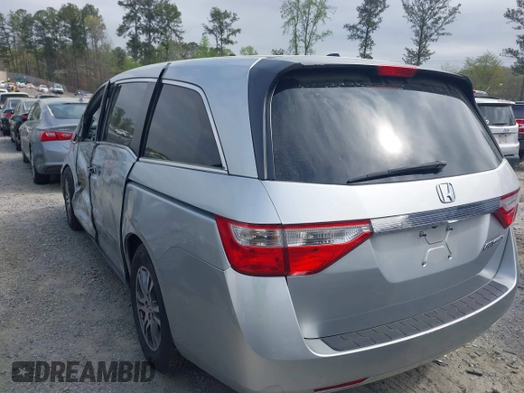 2012 Honda Odyssey EX-L with VIN 5FNRL5H66CB069916, listed as a IAAI auction lot 41935248 with 230,204 mi miles and . Bid and sale history available at carsss.com. Image 3.