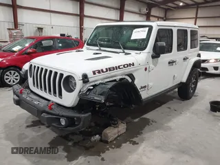 2021 Jeep Wrangler Unlimited Rubicon with VIN 1C4HJXFN2MW809904, listed as a IAAI auction lot 41567956 with 34,000 mi miles and . Bid and sale history available at DreamBid. Image 18.