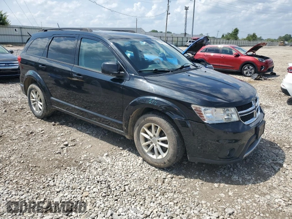 2013 Dodge Journey SXT with VIN 3C4PDDBG0DT532765, listed as a Copart auction lot 61481335 with 193,066 mi miles and Salvage title. Bid and sale history available at DreamBid. Image 4.