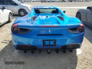 2018 Ferrari 488 z VIN ZFF80AMA9J0231686, wystawiony jako Copart lot #77623854 z przebiegiem Nie podano mil oraz Szkody całkowita. Historia ofert i sprzedaży dostępna na DreamBid. Obrazek 6.