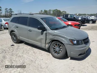 2020 Dodge Journey SE Value with VIN 3C4PDCAB8LT275871, listed as a Copart auction lot 48212735 with 82,741 mi miles and Salvage Title. Bid and sale history available at carsss.com. Image 4.