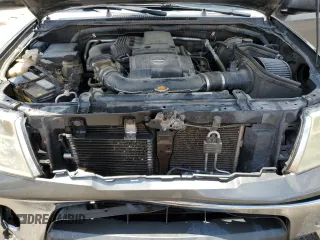 2008 Nissan Frontier SE with VIN 1N6AD07UX8C406795, listed as a Copart auction lot 61303185 with 145,742 mi miles and Salvage title. Bid and sale history available at DreamBid. Image 11.