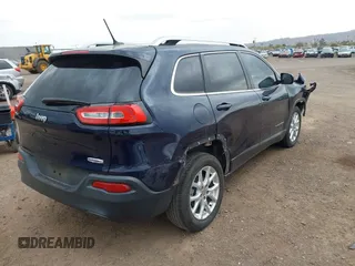 2015 Jeep Cherokee Latitude with VIN 1C4PJLCB8FW506398, listed as a IAAI auction lot 41796516 with 95,204 mi miles and . Bid and sale history available at DreamBid. Image 4.