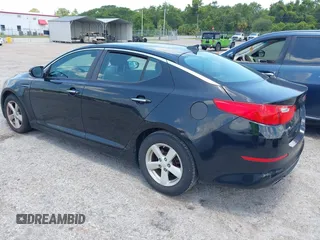 2015 Kia Optima LX z VIN KNAGM4A77F5651513, wystawiony jako IAAI lot #42385705 z przebiegiem 144 111 mil mil oraz . Historia ofert i sprzedaży dostępna na DreamBid. Obrazek 3.