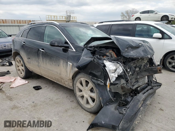 2015 Cadillac SRX Performance Collection with VIN 3GYFNFE32FS605151, listed as a Copart auction lot 53712665 with Not provided miles and Salvage title. Bid and sale history available at DreamBid. Image 4.