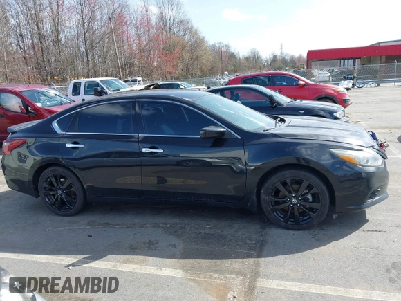 2018 Nissan Altima 2.5 SR with VIN 1N4AL3AP4JC478503, listed as a IAAI auction lot 41731574 with 134,206 mi miles. Bid and sale history available at carsss.com. Image 13.