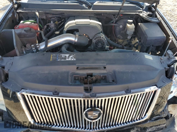 2007 Cadillac Escalade z VIN 1GYFK63807R187572, wystawiony jako Copart lot #54098225 z przebiegiem Nie podano mil oraz Szkoda całkowita • Salvage title. Historia ofert i sprzedaży dostępna na DreamBid. Obrazek 12.
