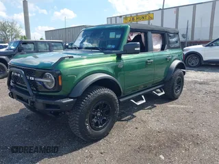 2023 Ford Bronco with VIN 1FMEE5DP0PLB80676, listed as a IAAI auction lot 42210054 with 6,796 mi miles and . Bid and sale history available at DreamBid. Image 2.