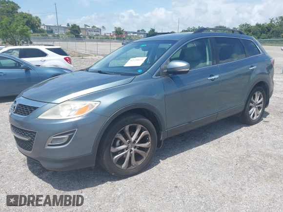 2012 Mazda CX-9 Grand Touring z VIN JM3TB2DA8C0354172, wystawiony jako IAAI lot #42739121 z przebiegiem 208 287 mil mil oraz . Historia ofert i sprzedaży dostępna na DreamBid. Obrazek 2.