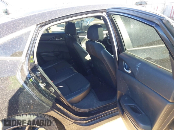 2019 Honda Civic Sport with VIN 19XFC2F80KE033598, listed as a IAAI auction lot 41732698 with 101,664 mi miles and . Bid and sale history available at DreamBid. Image 8.