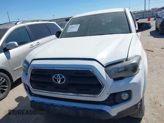 2021 Toyota Tacoma SR with VIN 3TYAX5GN6MT016452, listed as a IAAI auction lot 41816457 with 30,617 mi miles and . Bid and sale history available at DreamBid. Image 6.