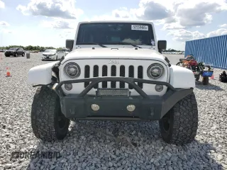2016 Jeep Wrangler Unlimited Rubicon with VIN 1C4BJWFG9GL103312, listed as a Copart auction lot 52559465 with 79,692 mi miles and Salvage Title. Bid and sale history available at carsss.com. Image 5.
