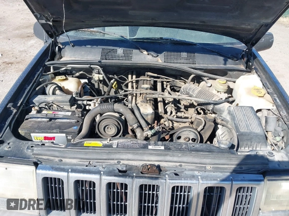1997 Jeep Grand Cherokee Laredo with VIN 1J4GZ58S4VC633205, listed as a IAAI auction lot 41727571 with 201,228 mi miles. Bid and sale history available at carsss.com. Image 10.