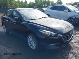 2017 Mazda 3 Touring with VIN 3MZBN1V74HM128575, listed as a IAAI auction lot 42731487 with 99,999 mi miles and . Bid and sale history available at DreamBid. Image 1.