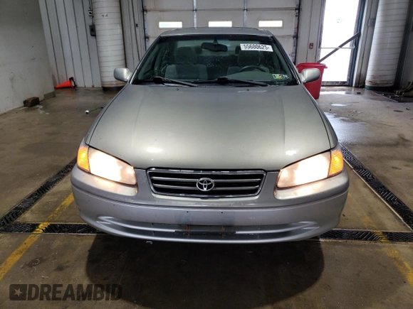2001 Toyota Camry CE z VIN JT2BG22K410558183, wystawiony jako Copart lot #55600625 z przebiegiem 69 689 mil mil oraz Szkoda całkowita • Salvage title. Historia ofert i sprzedaży dostępna na DreamBid. Obrazek 5.