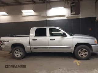 2005 Dodge Dakota SLT with VIN 1D7HW48N15S164352, listed as a IAAI auction lot 42190403 with 150,794 mi miles and . Bid and sale history available at carsss.com. Image 13.