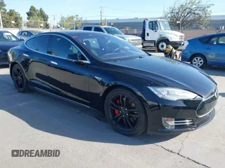 2014 Tesla Model S P85D with VIN 5YJSA1H22EFP65530, listed as a IAAI auction lot 41959941 with 76,532 mi miles and . Bid and sale history available at DreamBid. Image 1.
