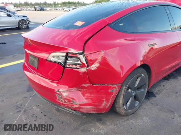 2023 Tesla Model 3 with VIN 5YJ3E1EA2PF588467, listed as a IAAI auction lot 42254921 with 11,217 mi miles and . Bid and sale history available at DreamBid. Image 6.