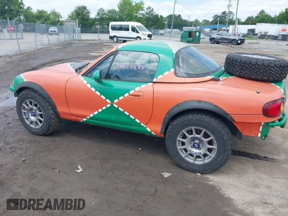 1999 Mazda MX-5 Miata with VIN JM1NB3531X0116676, listed as a IAAI auction lot 42454285 with 201,534 mi miles and . Bid and sale history available at DreamBid. Image 6.