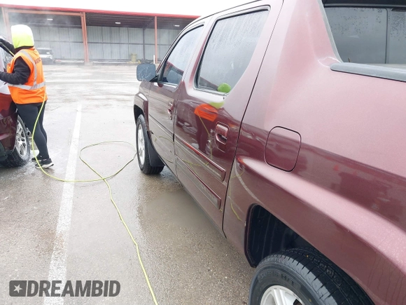 2009 Honda Ridgeline RTL with VIN 5FPYK16529B100032, listed as a IAAI auction lot 41206781 with 130,694 mi miles and . Bid and sale history available at DreamBid. Image 6.