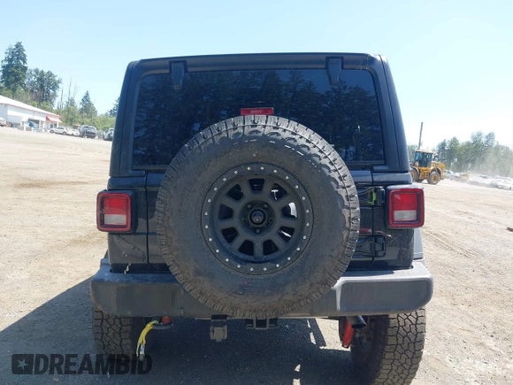 2018 Jeep Wrangler Unlimited Sport S with VIN 1C4HJXDN1JW216825, listed as a IAAI auction lot 42405799 with 37,194 mi miles and . Bid and sale history available at DreamBid. Image 16.