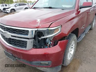 2020 Chevrolet Suburban LT with VIN 1GNSKHKC9LR233603, listed as a IAAI auction lot 41311582 with 104,754 mi miles. Bid and sale history available at carsss.com. Image 6.