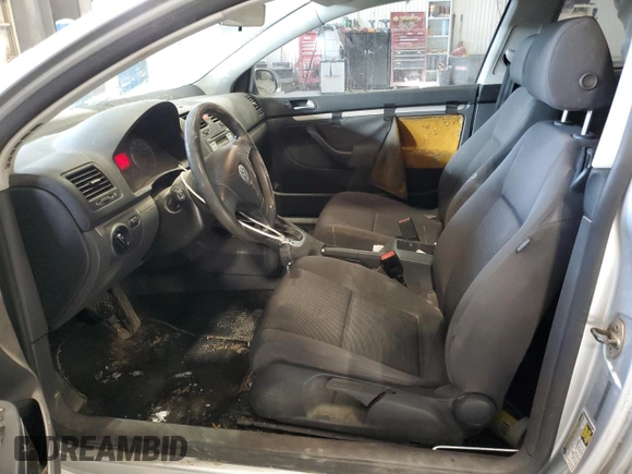 2009 Volkswagen Rabbit S with VIN WVWBB71K29W003438, listed as a Copart auction lot 46041015 with 128,351 mi miles and Clean title. Bid and sale history available at DreamBid. Image 7.