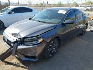 2022 Honda Insight Touring with VIN 19XZE4F93NE005200, listed as a IAAI auction lot 41994116 with 79,549 mi miles and . Bid and sale history available at carsss.com. Image 2.