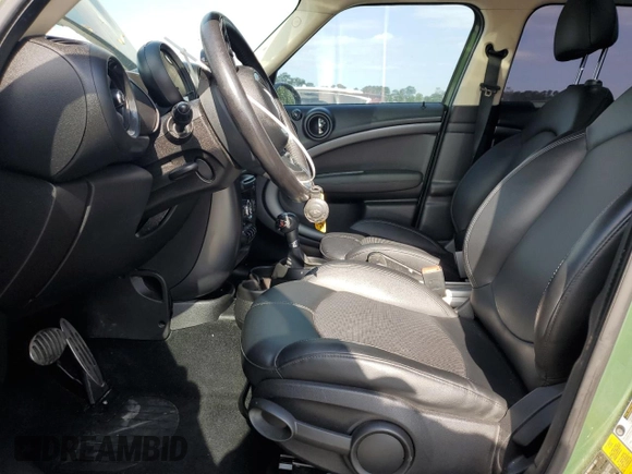 2015 MINI Countryman S z VIN WMWZC3C54FWT02806, wystawiony jako Copart lot #55508825 z przebiegiem 91 796 mil mil oraz Szkoda całkowita • Salvage title. Historia ofert i sprzedaży dostępna na DreamBid. Obrazek 7.