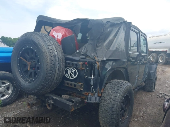 2008 Jeep Wrangler Unlimited X z VIN 1J4GA39138L641138, wystawiony jako IAAI lot #42376300 z przebiegiem 215 026 mil mil oraz . Historia ofert i sprzedaży dostępna na DreamBid. Obrazek 4.