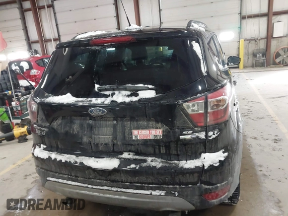 2017 Ford Escape SE with VIN 1FMCU9GD8HUE81307, listed as a IAAI auction lot 41386675 with 133,821 mi miles and . Bid and sale history available at DreamBid. Image 16.