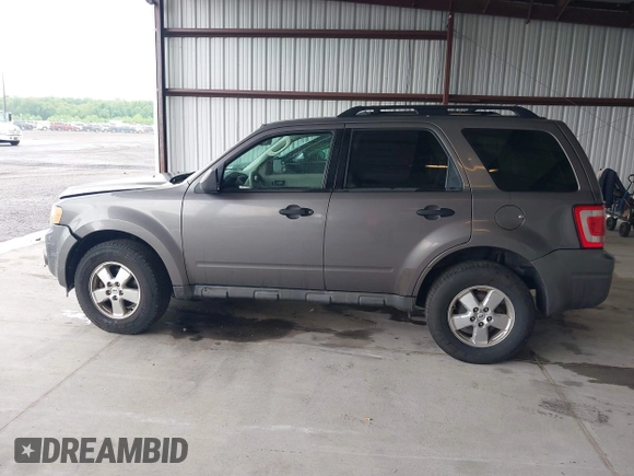 2009 Ford Escape XLS with VIN 1FMCU02759KC84959, listed as a IAAI auction lot 42219257 with 263,087 mi miles and . Bid and sale history available at DreamBid. Image 14.