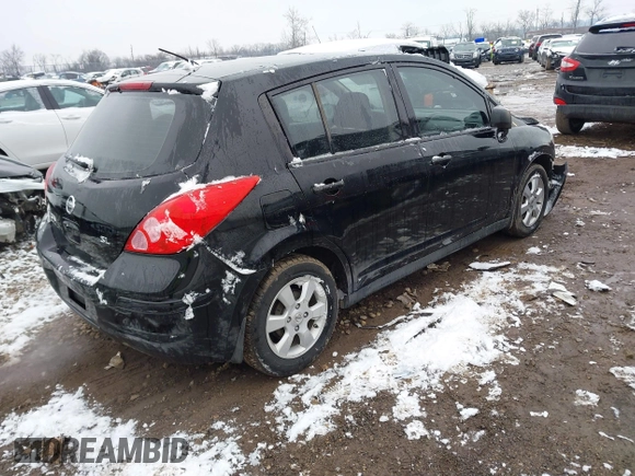 2009 Nissan Versa 1.8 SL with VIN 3N1BC13E49L427102, listed as a IAAI auction lot 41553357 with 133,300 mi miles. Bid and sale history available at carsss.com. Image 4.