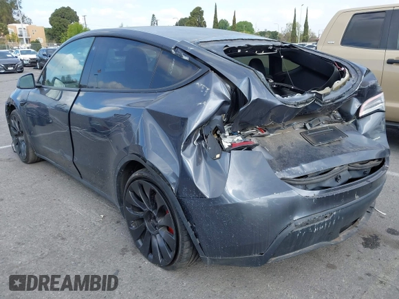 2022 Tesla Model Y Performance with VIN 7SAYGDEF7NF563433, listed as a IAAI auction lot 41713557 with Not Provided miles and . Bid and sale history available at DreamBid. Image 3.