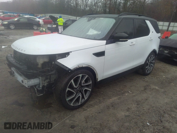 2018 Land Rover Discovery HSE Luxury z VIN SALRT2RV3JA057709, wystawiony jako IAAI lot #41563821 z przebiegiem 99 639 mil mil oraz . Historia ofert i sprzedaży dostępna na DreamBid. Obrazek 2.