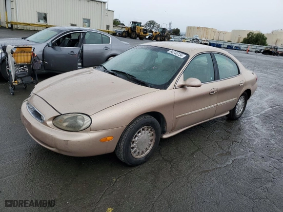 1996 Mercury Sable LS with VIN 1MELM53S0TA607489, listed as a Copart auction lot 85730734 with 113,214 mi miles and Salvage Title. Bid and sale history available at carsss.com. Image 1.