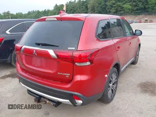 2017 Mitsubishi Outlander SE z VIN JA4AZ3A3XHZ059420, wystawiony jako IAAI lot #42611077 z przebiegiem 130 406 mil mil oraz . Historia ofert i sprzedaży dostępna na DreamBid. Obrazek 4.