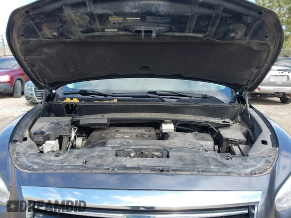 2013 Infiniti JX35 with VIN 5N1AL0MM5DC341869, listed as a IAAI auction lot 41921935 with 126,897 mi miles and . Bid and sale history available at DreamBid. Image 10.
