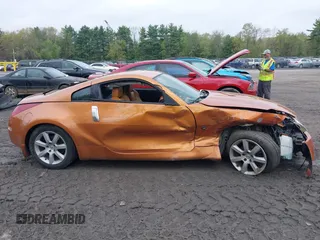 2003 Nissan 350Z Touring z VIN JN1AZ34E73T003839, wystawiony jako IAAI lot #42206083 z przebiegiem 50 919 mil mil oraz . Historia ofert i sprzedaży dostępna na DreamBid. Obrazek 13.