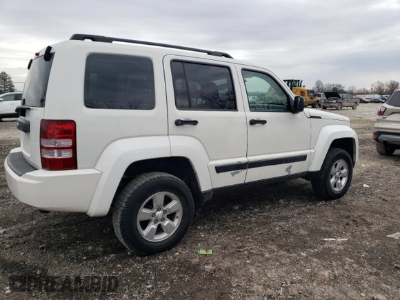 2010 Jeep Liberty Sport with VIN 1J4PP2GK9AW133958, listed as a Copart auction lot 47265675 with 124,466 mi miles and Salvage Title. Bid and sale history available at DreamBid. Image 3.