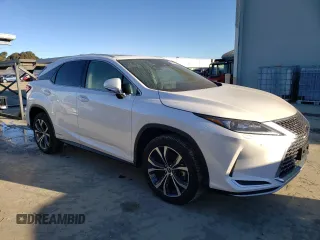 2021 Lexus RX with VIN 2T2HGMDA5MC070660, listed as a Copart auction lot 38193933 with 9,711 mi miles. Bid and sale history available at carsss.com. Image 4.