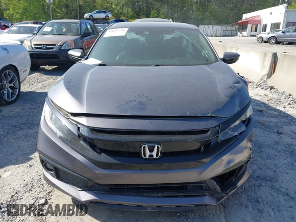 2019 Honda Civic Sport with VIN 2HGFC2F8XKH598141, listed as a IAAI auction lot 42013724 with 98,401 mi miles and . Bid and sale history available at DreamBid. Image 12.