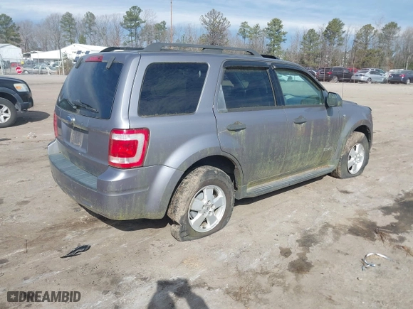 2008 Ford Escape XLT with VIN 1FMCU03178KA47527, listed as a IAAI auction lot 41672719 with 306,312 mi miles. Bid and sale history available at carsss.com. Image 4.