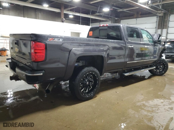 2015 Chevrolet Silverado 2500HD LTZ with VIN 1GC1KWE89FF579463, listed as a Copart auction lot 47570195 with 0 mi miles and Salvage Title. Bid and sale history available at carsss.com. Image 3.