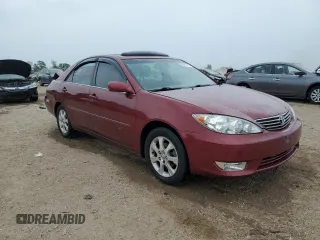 2005 Toyota Camry LE with VIN 4T1BE30KX5U086586, listed as a Copart auction lot 60291715 with 180,421 mi miles and Salvage title. Bid and sale history available at DreamBid. Image 4.
