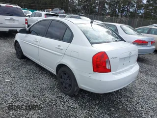 2006 Hyundai Accent GLS with VIN KMHCN46C36U009036, listed as a IAAI auction lot 41705369 with 134,328 mi miles. Bid and sale history available at carsss.com. Image 3.