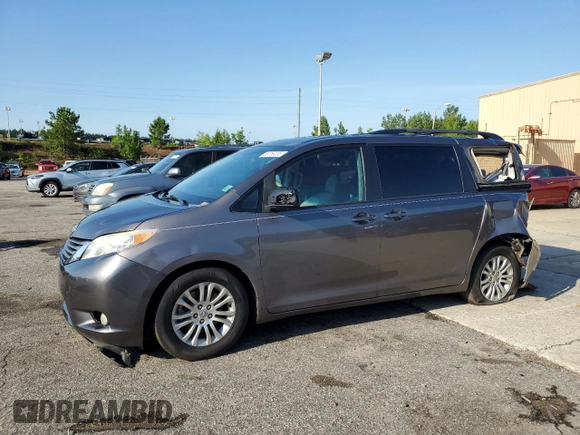 2012 Toyota Sienna XLE AAS with VIN 5TDYK3DC1CS279575, listed as a Copart auction lot 60350235 with 275,287 mi miles and Salvage title. Bid and sale history available at DreamBid. Image 1.