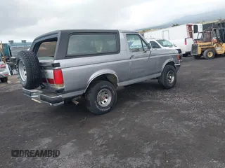 1987 Ford Bronco Custom with VIN 1FMEU15H4HLA38822, listed as a IAAI auction lot 41980537 with 81,328 mi miles. Bid and sale history available at carsss.com. Image 4.