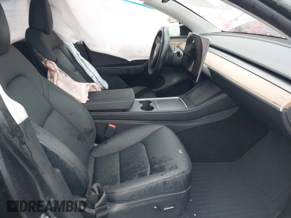 2024 Tesla Model Y Long Range with VIN 7SAYGDEE5RA241433, listed as a IAAI auction lot 41569277 with 7,490 mi miles. Bid and sale history available at carsss.com. Image 5.